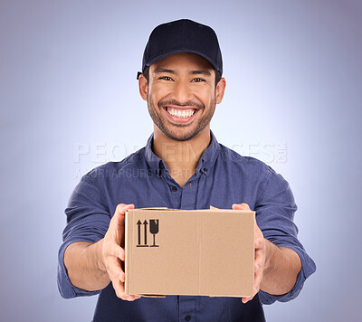 Buy stock photo Portrait, man and courier with box, happiness and shipping with logistics against blue studio background. Face, male employee and delivery person with package, parcel and mail distribution service