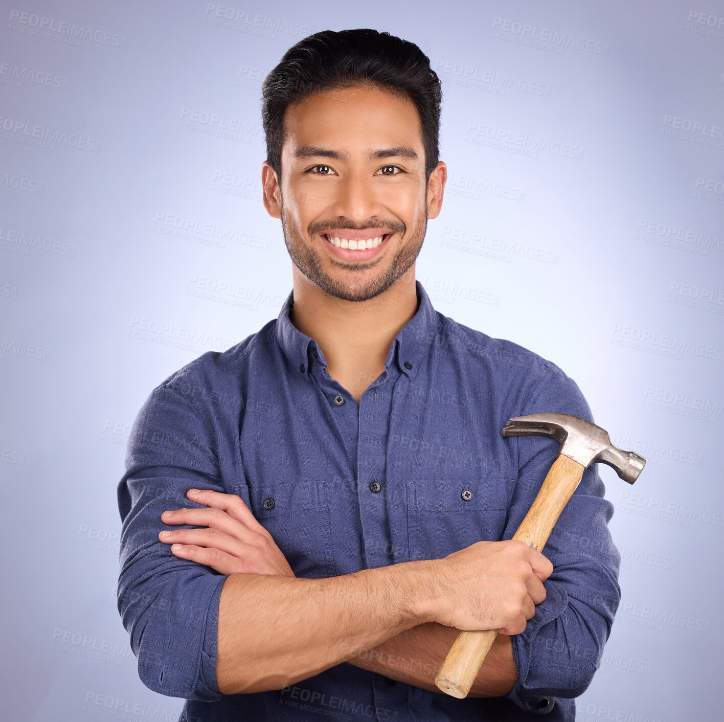 Buy stock photo Man, studio and portrait with tools or hammer for handyman, maintenance or repair work with smile. Happy asian model person on purple background arms crossed for engineer, mechanic or technician job