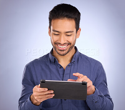 Buy stock photo Happy business man on tablet isolated on studio background for stock market research with online app. Happy asian person, worker or entrepreneur on digital technology for profit, sales and fintech