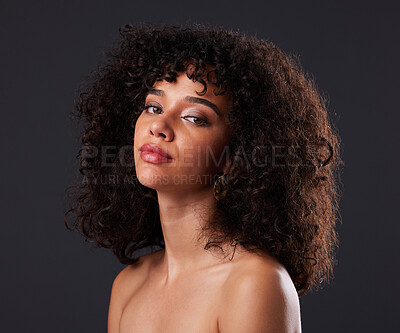 Buy stock photo Portrait, makeup and beauty by black woman in studio for glamour, treatment and body care on black background. Face, girl and curly afro model relax with luxury, soft and glowing skin while isolated 