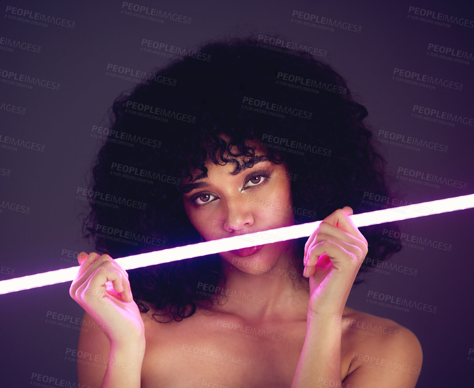 Buy stock photo Purple light, woman and beauty portrait in studio with neon uv fashion for makeup cosmetics. Face of aesthetic gen z model black person on dark background for natural art glow on skin or afro hair