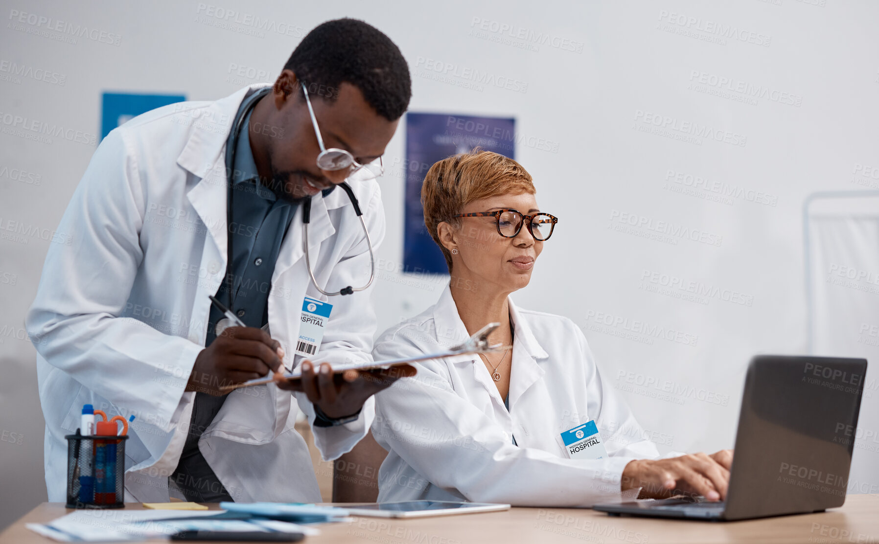 Buy stock photo Teamwork, planning and doctors at desk for research training, hospital data review and laptop management. Paperwork, checklist document and serious analysis of medical black people working in office