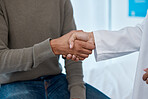 Closeup, handshake and doctor with man, healthcare and appointment for diagnosis, cure and results. Zoom, hand and medical professional with male patient, schedule for procedure and appreciation