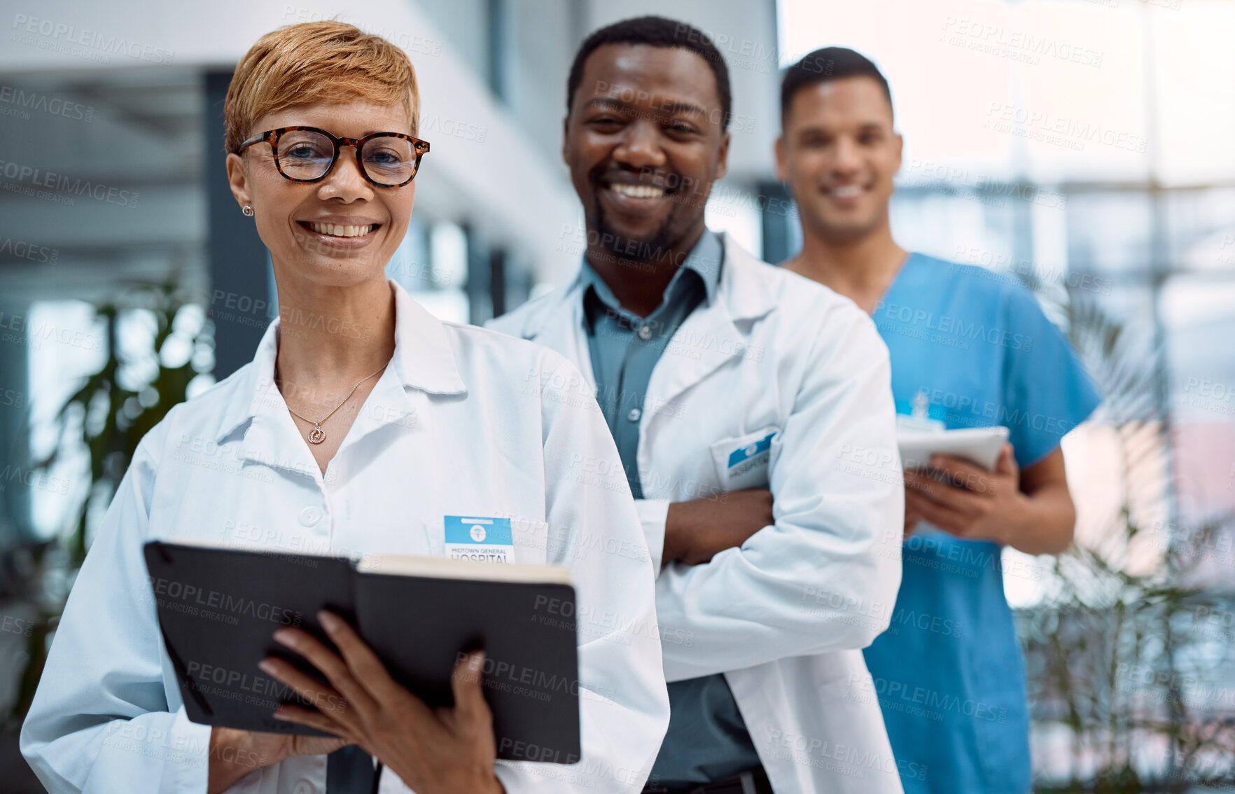 Buy stock photo Portrait team of doctors working in hospital research, planning and management for healthcare service. Leadership, mindset and manager or medical professional with black people staff in clinic career