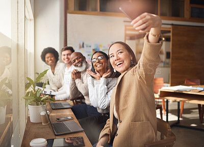 Buy stock photo Selfie, friends and memory with a business team working in the boardroom of their corporate workplace. Teamwork, profile picture and startup with a group of people posing for a photograph together