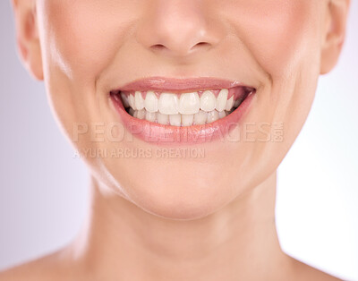 Buy stock photo Teeth, dental and oral hygiene with a model woman in studio on a gray background for tooth whitening. Dentist, healthcare and veneers with a female indoor to show a happy smile at a mouth specialist