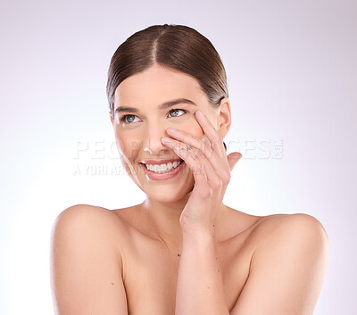 Buy stock photo Skincare, woman and touch face in studio for beauty, dermatology or wellness cosmetics on background. Happy female model, smile and aesthetic glow of shine, laser transformation or facial spa results
