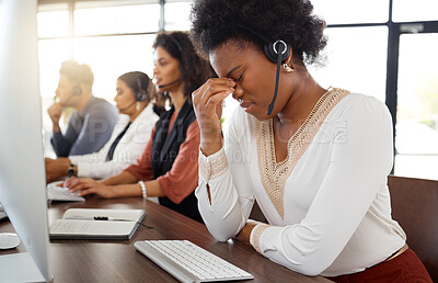 Buy stock photo Call center, headache and black woman stress in telemarketing team with crm problem. Customer service anxiety, web support and burnout of a technical office employee working online on a help desk