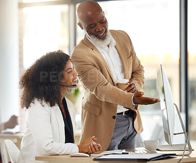 Buy stock photo Call center, customer service and manager training a consultant with an online consultation. Contact us, professional and African male leader helping a female employee with crm strategy in the office