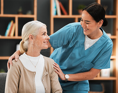 Buy stock photo Nursing home, senior woman and nurse with a smile from retirement and support happiness. Bonding, healthcare and Asian caregiver feeling happy from elderly care and medical job with a elderly female