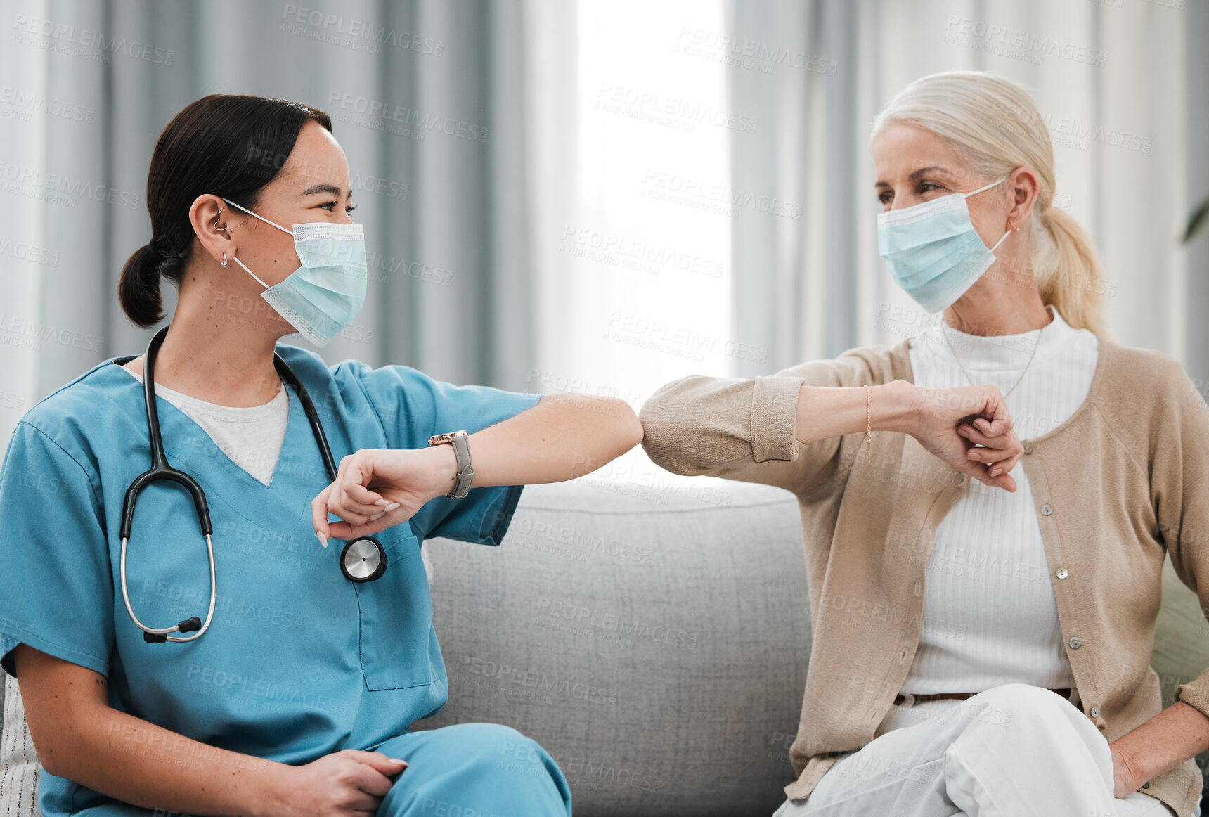Buy stock photo Covid greeting, mask and nursing home with Asian nurse and senior woman in retirement. Happy, handshake and healthcare clinic with a patient and wellness worker with smile and friendship in hospital