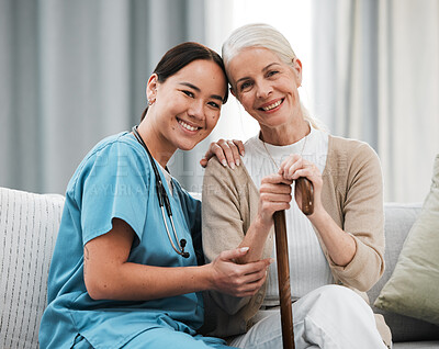Buy stock photo Nurse, elderly woman and sofa for portrait, walking stick and smile together with happiness, chat and care. Senior patient, asian doctor and couch with helping hand, happy and connection for support