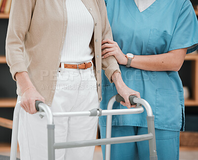 Buy stock photo Nurse or senior hands on walking frame for support, help or trust moving legs in rehabilitation. Physiotherapy healthcare, elderly nursing or medical caregiver consulting disabled patient