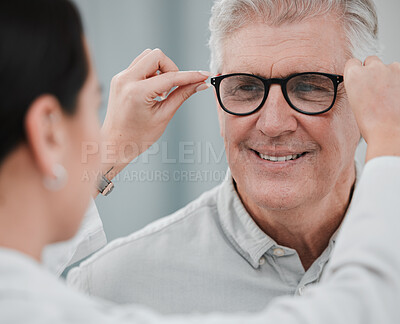 Buy stock photo Glasses check, senior vision and elderly man at a consulting optometry clinic for wellness. Happy, smile and old face with lens, frame and eyewear choice in a store for help getting a prescription 
