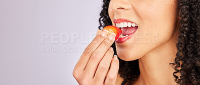 Buy stock photo Mockup, strawberry and mouth with a black woman eating in studio on a gray background to promote health. Food, fruit and beauty with a female biting a berry on blank mock up space for a wellness diet