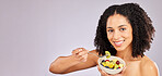 Black woman, fruit salad and studio portrait for breakfast, nutrition and smile by background. Young african, gen z model and fruits for healthy, diet and beauty mockup with energy, happiness or care