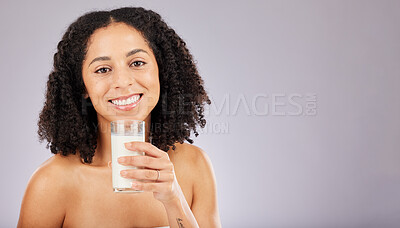 Buy stock photo Portrait, milk nutrition and black woman in studio isolated on a gray background mockup. Face, health and wellness of female with healthy drink for vitamin d, diet or skincare, beauty and calcium.