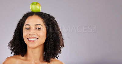 Buy stock photo Apple, green fruit and portrait of a black woman holding wellness food for detox and weight loss. Skincare, beauty and young model in a isolated studio for nutrition and vitamin diet with mockup