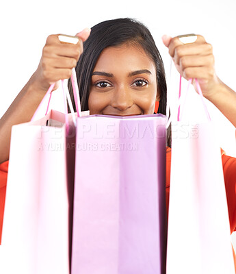 Buy stock photo Retail, Indian woman portrait and shopping bag from discount sale or fashion promotion. Happy customer, gen z female model and clothes product deal with paper bags after designer sales in studio
