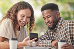 Interracial couple, phone and laughing for social media, funny joke or meme with coffee at cafe. Happy woman and man share laugh looking at mobile smartphone with 5G connection for entertainment