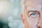 Retina, vision and mockup with blue eye of old man for focus, optometry and healthcare. Iris, human and awareness with senior male and pupil for sight, natural and ophthalmology in bokeh  background
