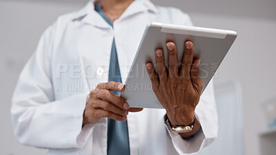 Buy stock photo Hands, tablet and medical doctor in hospital for research, telehealth or online consultation. Healthcare, technology and senior woman or female physician with digital touchscreen for wellness app.