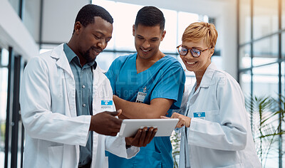 Buy stock photo Doctor, team and tablet in healthcare planning for research, idea or meeting on technology at hospital. Happy group of doctors with touchscreen for medical data, collaboration or teamwork strategy