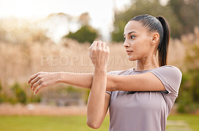 Buy stock photo Health, fitness and woman stretching arms in nature to get ready for workout, training or exercise. Sports, thinking and female athlete stretch and warm up to start exercising, cardio or running.
