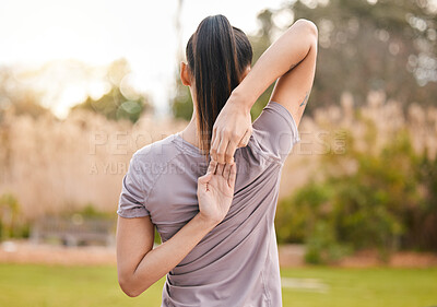 Buy stock photo Back, fitness and woman stretching arms in nature to get ready for workout, training or exercise. Sports, health and young female athlete stretch and warm up to start exercising, cardio or running.