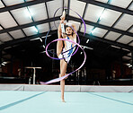 Portrait, ribbon and motion blur with a gymnastics woman in a studio for olympics dance training or exercise. Fitness, art and gymnast with a female dancer in a gymnasium for rhythmic practice