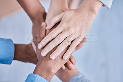 Buy stock photo Business people, diversity and hands together above in trust, partnership or collaboration at the office. Group of diverse employee workers piling hand in teamwork, support or agreement in solidarity