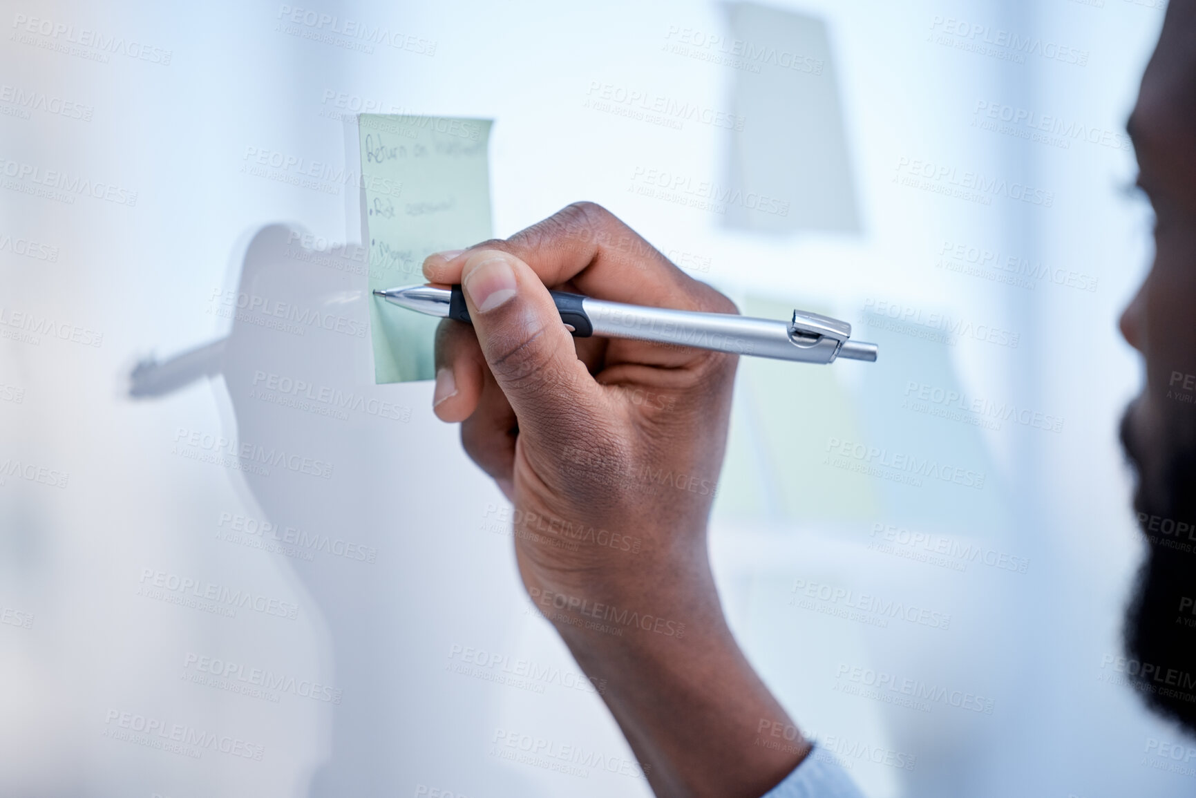 Buy stock photo Black man, hands and writing for schedule planning, brainstorming or tasks on glass board at office. Hand of African American male with pen to write project plan, idea or sticky note for strategy