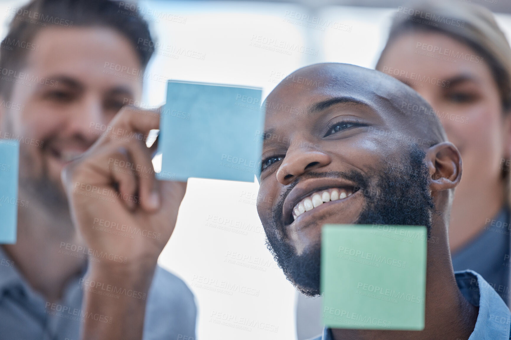 Buy stock photo Black man, writing and smile for schedule planning on glass board for team brainstorming or tasks at office. Happy African male smiling in project plan, ideas or sticky note for teamwork strategy