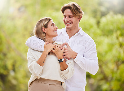 Buy stock photo Park, love and couple with smile outdoor for happy, quality time and bonding on weekend, vacation and holiday. Dating, summer and young man and woman hugging, relax and romantic embrace in nature