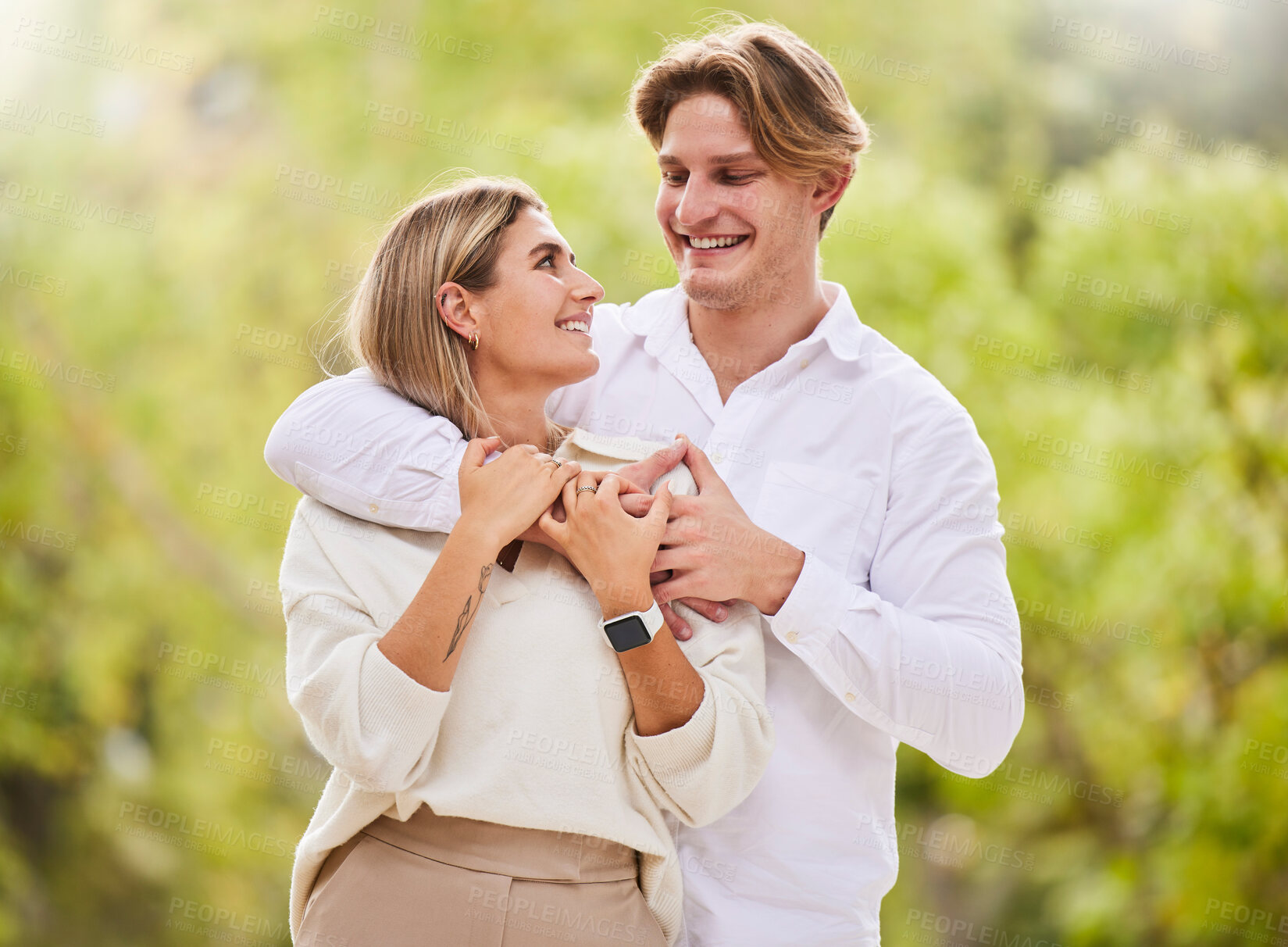 Buy stock photo Park, love and couple with smile outdoor for happy, quality time and bonding on weekend, vacation and holiday. Dating, summer and young man and woman hugging, relax and romantic embrace in nature