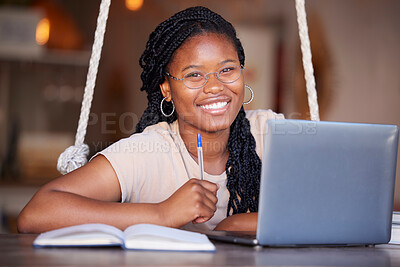 Buy stock photo Remote work, portrait and black woman doing elearning on a laptop, studying and learning with notes. Education, smile and African home student doing online school, homework and preparing for an exam