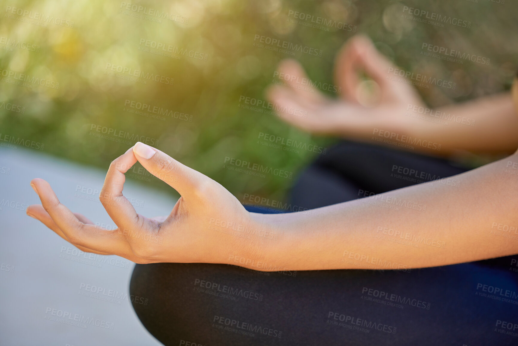 Buy stock photo Closeup, hands and woman in yoga, lotus and pose while training in nature for wellness, relax and zen. Zoom, hand and exercise by girl in meditation, chakra and energy balance, mindfulness or healing