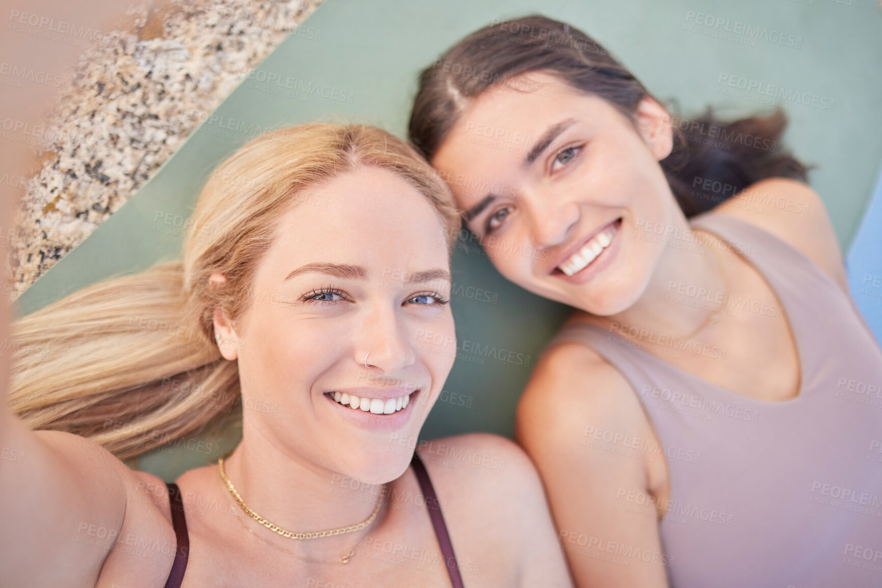 Buy stock photo Selfie, yoga and overhead with woman friends lying on the ground while taking a photograph outdoor together. Fitness, social media or pilates with a female yogi and friend resting after a workout