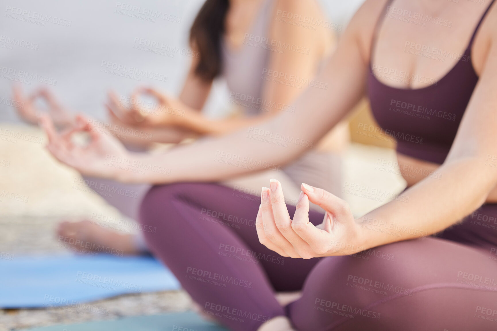 Buy stock photo Meditation, lotus hands and women outdoor to exercise in nature for fitness, peace and wellness. Yoga friends on beach ground for workout, training and energy for mental health, chakra and zen time