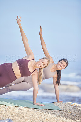 Buy stock photo Stretching, outdoor and portrait of women exercise in nature for fitness, peace and wellness. Yoga friends at beach for training workout or energy for mental health, side plank and balance with smile