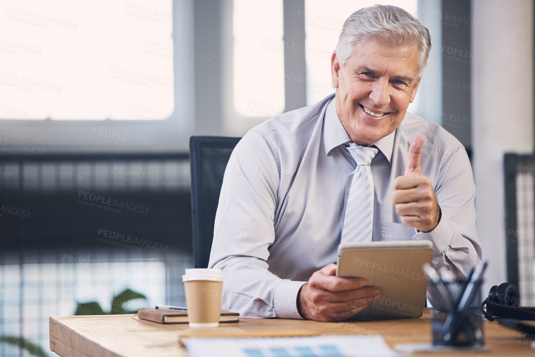 Buy stock photo Senior, business man and tablet with thumbs up portrait, analysis and planning at desk for schedule. Elderly stock broker, fintech and mobile touchscreen for email, market strategy or contact for ceo