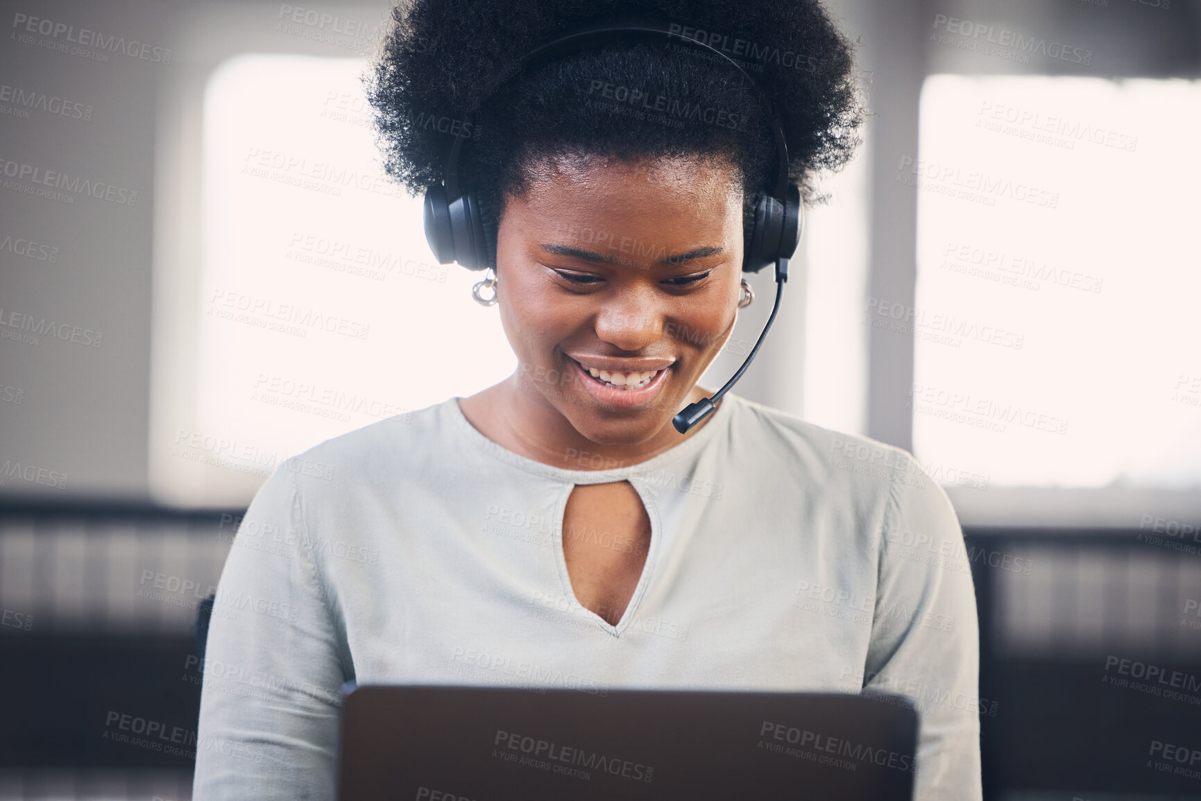 Buy stock photo Call center, laptop or happy black woman typing in office building startup agency with smile or focus. Microphone, customer services or African sales consultant in a telecom or communications company