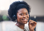 Portrait, call center and support with a black woman consultant working in her telesales office. Contact us, customer service and telemarketing with a female employee consulting using a headset