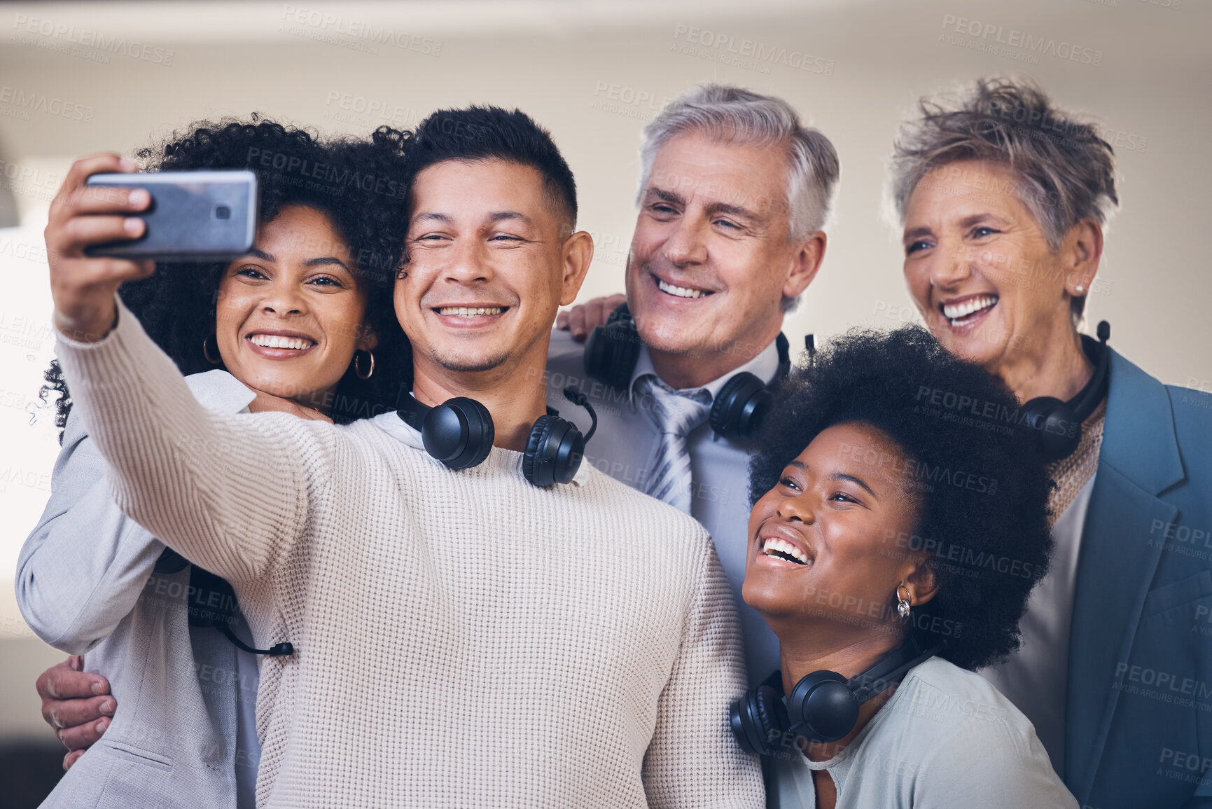 Buy stock photo Call center, men and women in happy selfie in office, diversity and happiness on smartphone app. Businessman, old woman and black people with profile picture, friends together and social network post