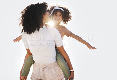 Buy stock photo Piggy back, mother and girl outdoor, love and happiness with quality time, playful and cheerful. Lens flare, family and mama carry daughter, smile and joyful on weekend break, fun or carefree outside