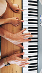 Piano, top view and hands of kid learning with father in home, playing or bonding together. Development, education or parent teaching child how to play music instrument, acoustic or electric keyboard