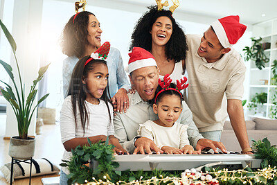 Buy stock photo Love, Christmas and family singing, quality time and happiness with bonding, loving and smile. Grandparents, happy mother and father with children, Xmas and festive season with decorations and carols