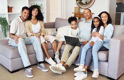 Buy stock photo Portrait, laptop and a black family in the living room of a home together, sitting on a sofa. Love, internet or bonding with children, parents and grandparents in the lounge of a house during a visit