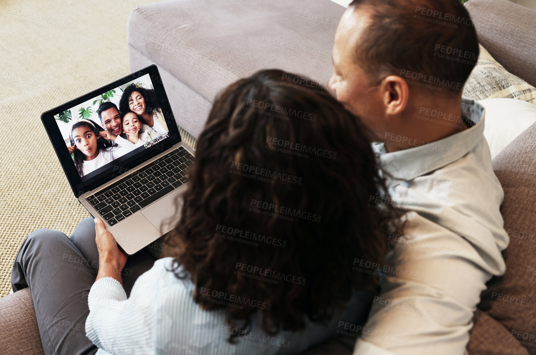 Buy stock photo Couple, laptop screen and video call on home sofa for communication and network connection. Man and woman in living room with technology for above virtual conversation, distance family chat or relax