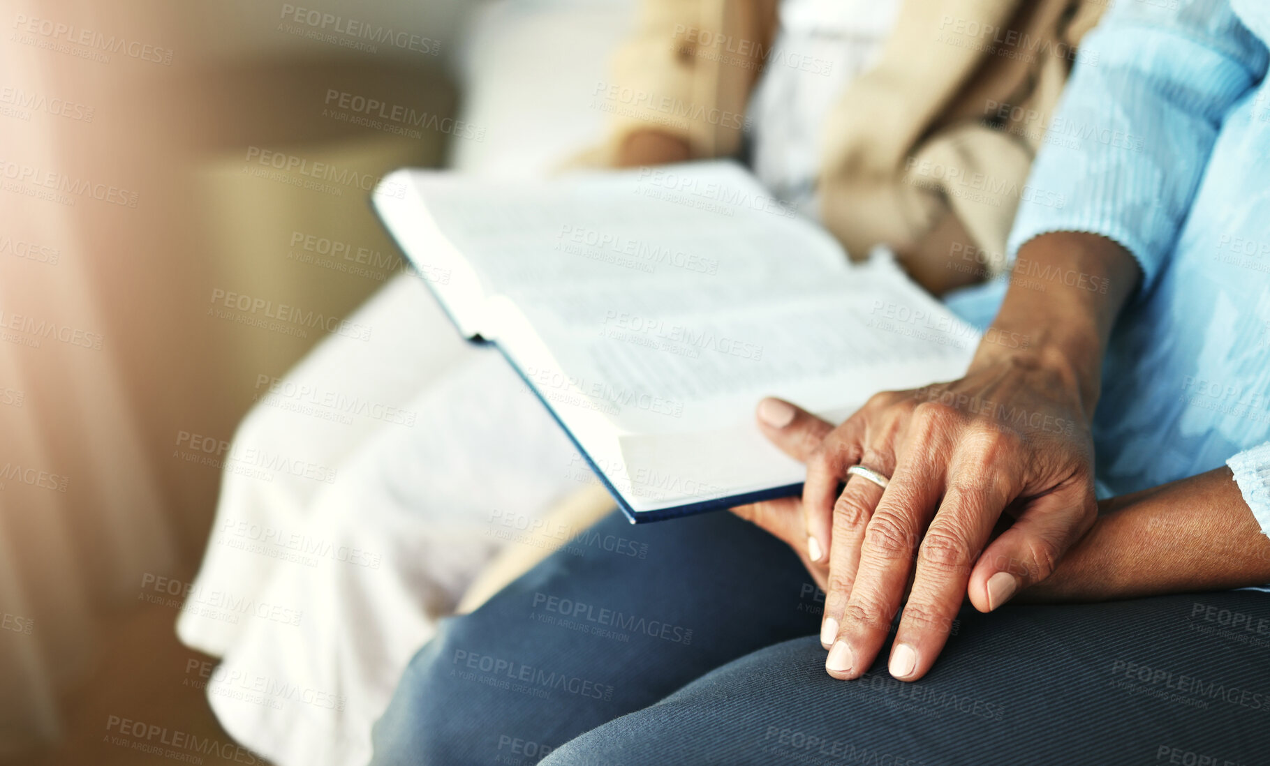 Buy stock photo Hands, bible and senior couple praying in their home together for scripture, faith and trust. Family, worship and praise with elderly man and woman united in prayer, holy or gratitude to Jesus Christ